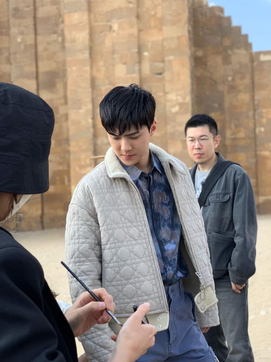 ReemSehunaa's tweet photo. We contacted a person who was with Sehun in Egypt, and he gave us these photos. He said that Sehun is a very quiet person, very shy, very respectful,Very professional,and made it easy for them to finish the photo shoot. eunwo was very supportive of him to overcome his shyness 😭 https://t.co/kd4u8jkT2f