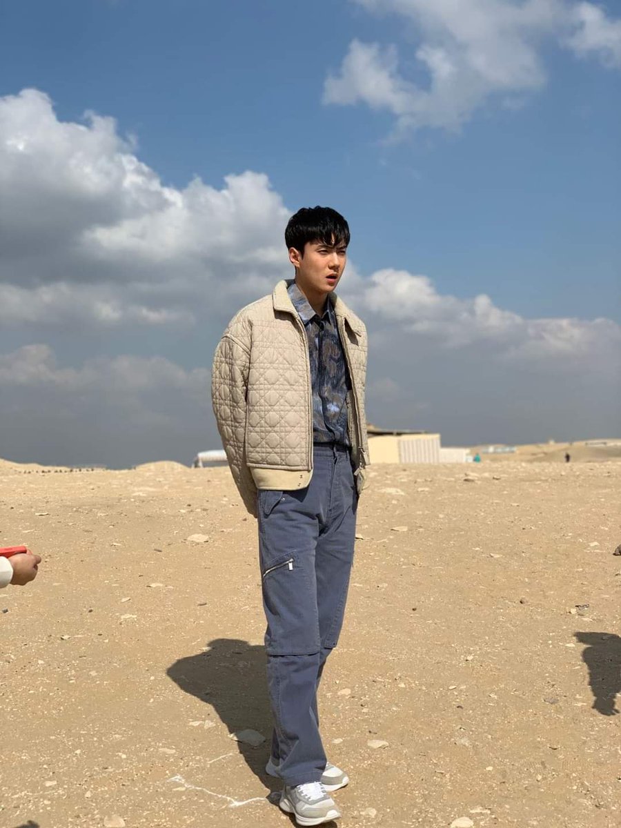 ReemSehunaa's tweet photo. We contacted a person who was with Sehun in Egypt, and he gave us these photos. He said that Sehun is a very quiet person, very shy, very respectful,Very professional,and made it easy for them to finish the photo shoot. eunwo was very supportive of him to overcome his shyness 😭 https://t.co/kd4u8jkT2f