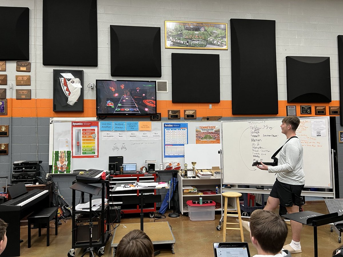 CHSDragonBand's tweet photo. It’s that time of the year when we bring out guitar hero on the ps3 ticket students unleash their inner rock star! @VandyFootball player @Barrett64Maddox giving his best shot on this classic tune! https://t.co/iC6LPYs4IQ