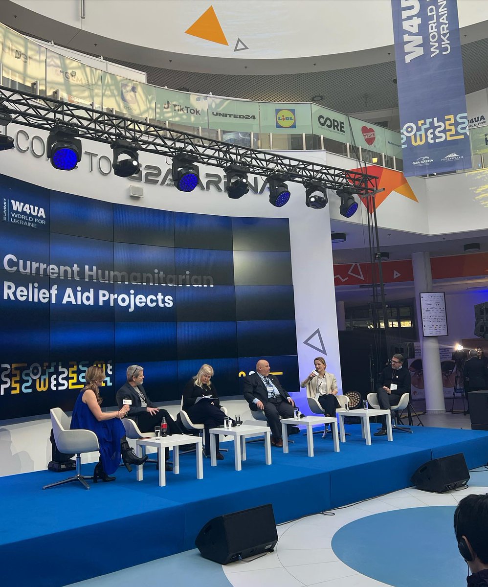 W4UA_Summit's tweet photo. 🔵 HIGH-LEVEL PANEL: CURRENT HUMANITARIAN RELIEF AID PROJECTS.
Main Stage 👇
#w4uafoundation #w4ua #w4uasummit #worldforukraine #worldforukrainesummit #g2aarena #rzeszów #podkarpackie #ukraine https://t.co/jauys571hC
