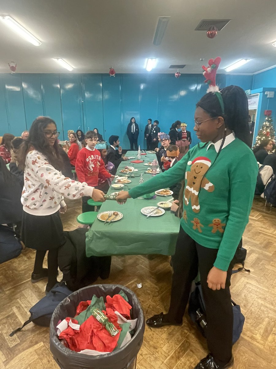 SpringwestA's tweet photo. We had a great Christmas lunch - the students really enjoyed being served and they loved their Christmas crackers and party hats! #community #character https://t.co/8epNoRMs8I
