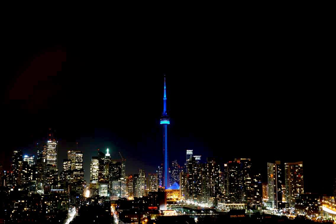 HRWcanada's tweet photo. Across the world, people will observe #HumanRightsDay by committing to uphold everyone’s freedoms and dignity.
In #Canada, landmarks across the country will shine blue as a reminder of this important day. #Blue4HumanRights https://t.co/m4m3hrwaxi