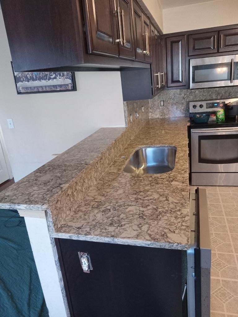 LlcStoneware's tweet photo. LG Symphony Quartz. It looks very natural, but it is actually handmade. For this job, we made a high backsplash up the wall to the bottom of the cabinets. Very modern and clean look! 🤩 https://t.co/pH3A0k4Gol