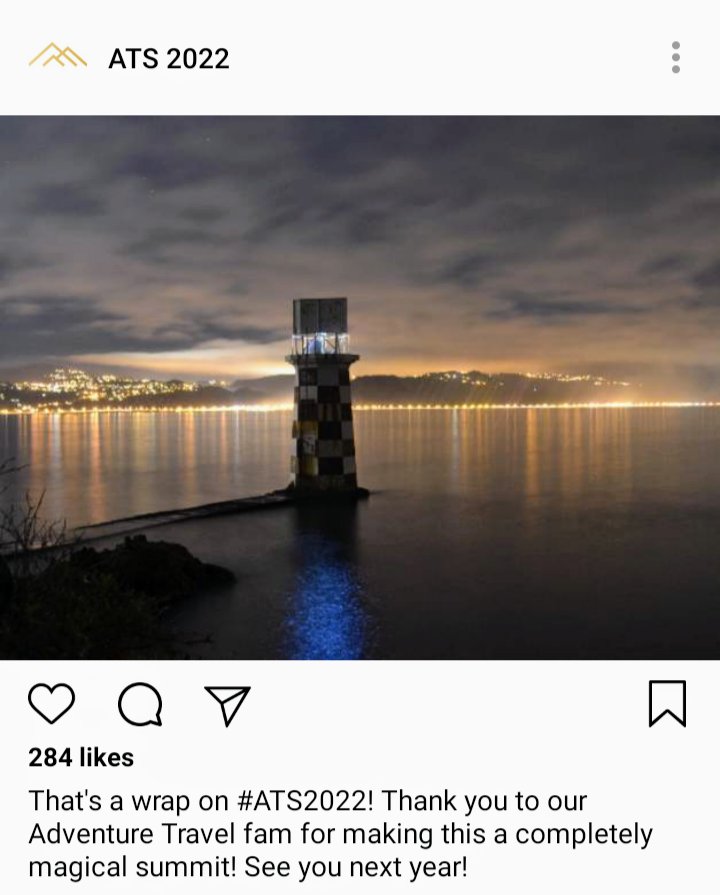 ATS IG account: image of Halswell Lighthouse IN Wellington at night, city Lights in the distance. Caption reads "That's a wrap on #ATS2022! Thank you to our Adventure Travel fam for making this a completely magical summit! See you next year! 