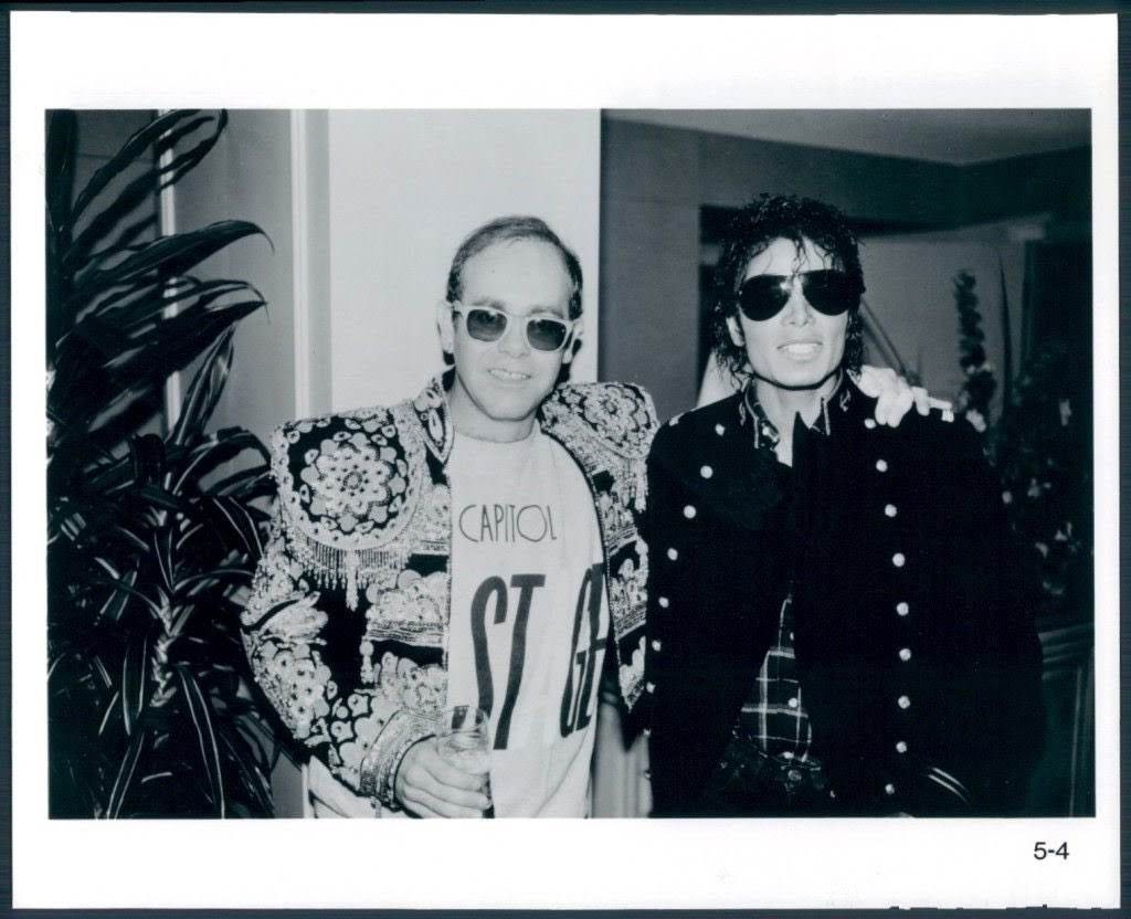 Michael Jackson photographed with a snake. Be careful of snakes.