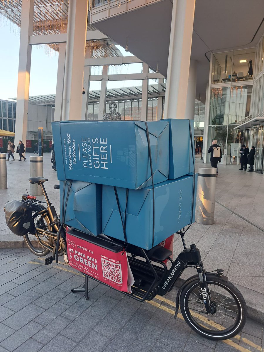 TeamLondonBdg's tweet photo. 🎁 It begins! Presents from @TheShardLondon being collected by @pedalmeapp #cargobike ready to be distributed to local charities. Thank you to everyone at The Shard for your donations! More #GiftBack collections to come next week 🎅💚 https://t.co/IeKBOO8e9d https://t.co/IwsOVFiqw6