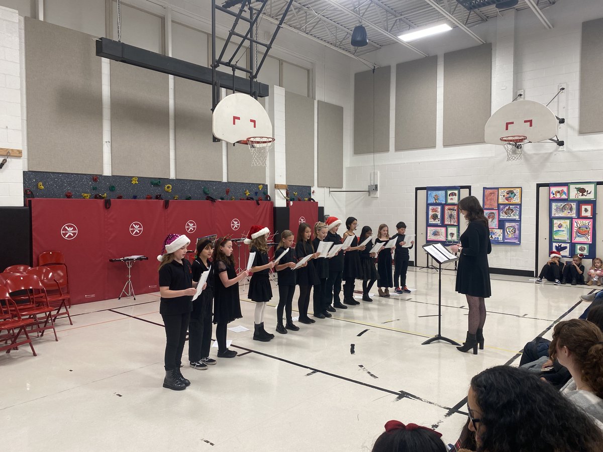 Hough choir did an AMAZING job at our holiday concert with band and orchestra last night!! Check out some photos from the evening! ⛄️❄️  #WeBelong220 #artsmatter220 #arts220strong <a href="/HoughStreet220/">Hough Street School</a>