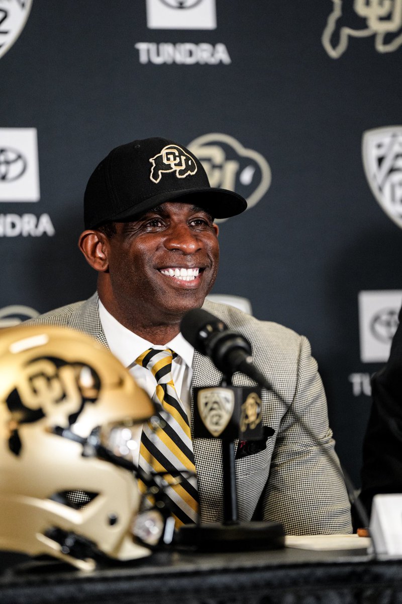 Pac12Network's tweet photo. Black and gold suits you well, Coach Prime. 🤩 https://t.co/qcBaqexVbb
