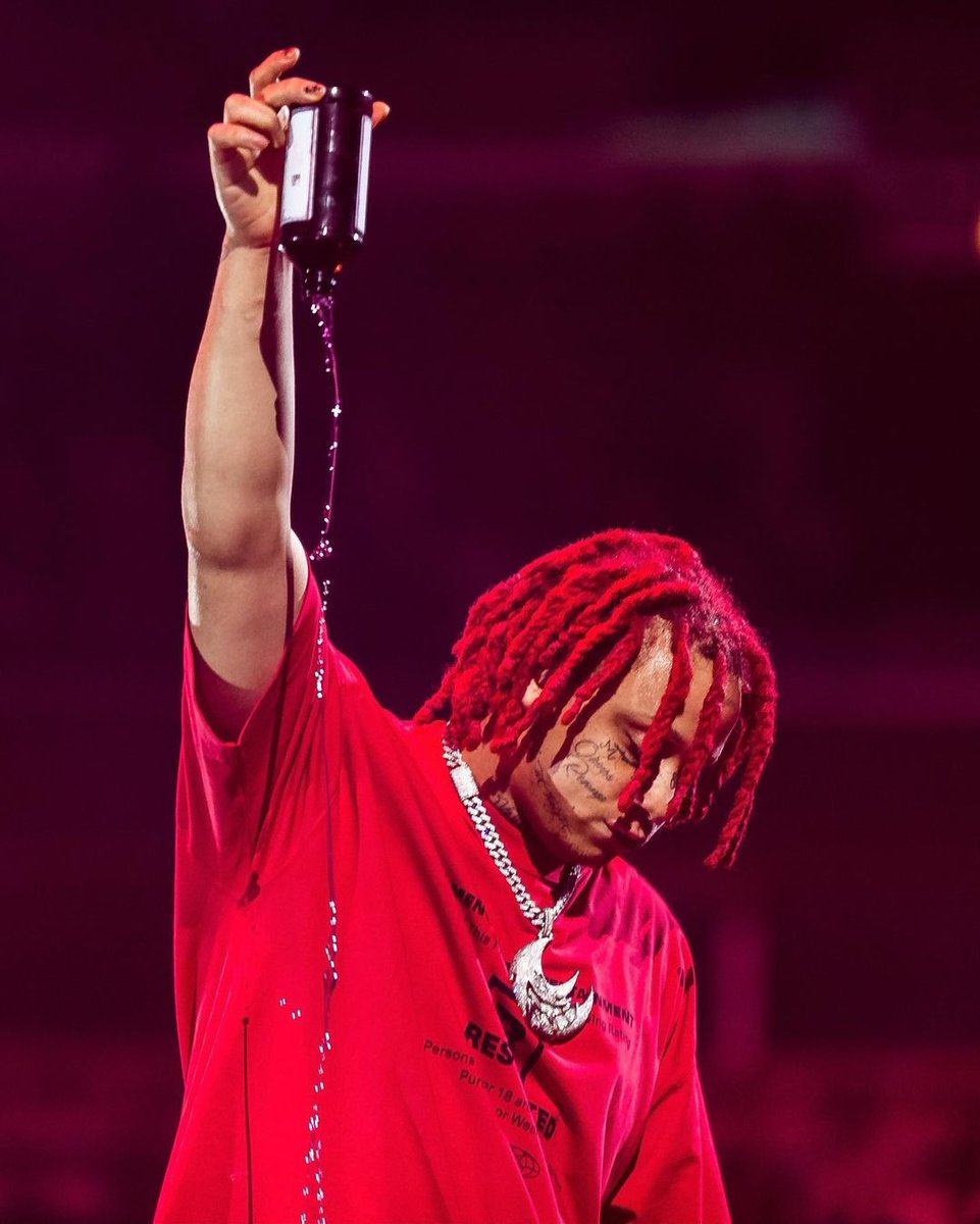 Trippie Redd pouring an entire pint of lean in tribute to Juice WRLD, during the 2021 Juice WRLD Day