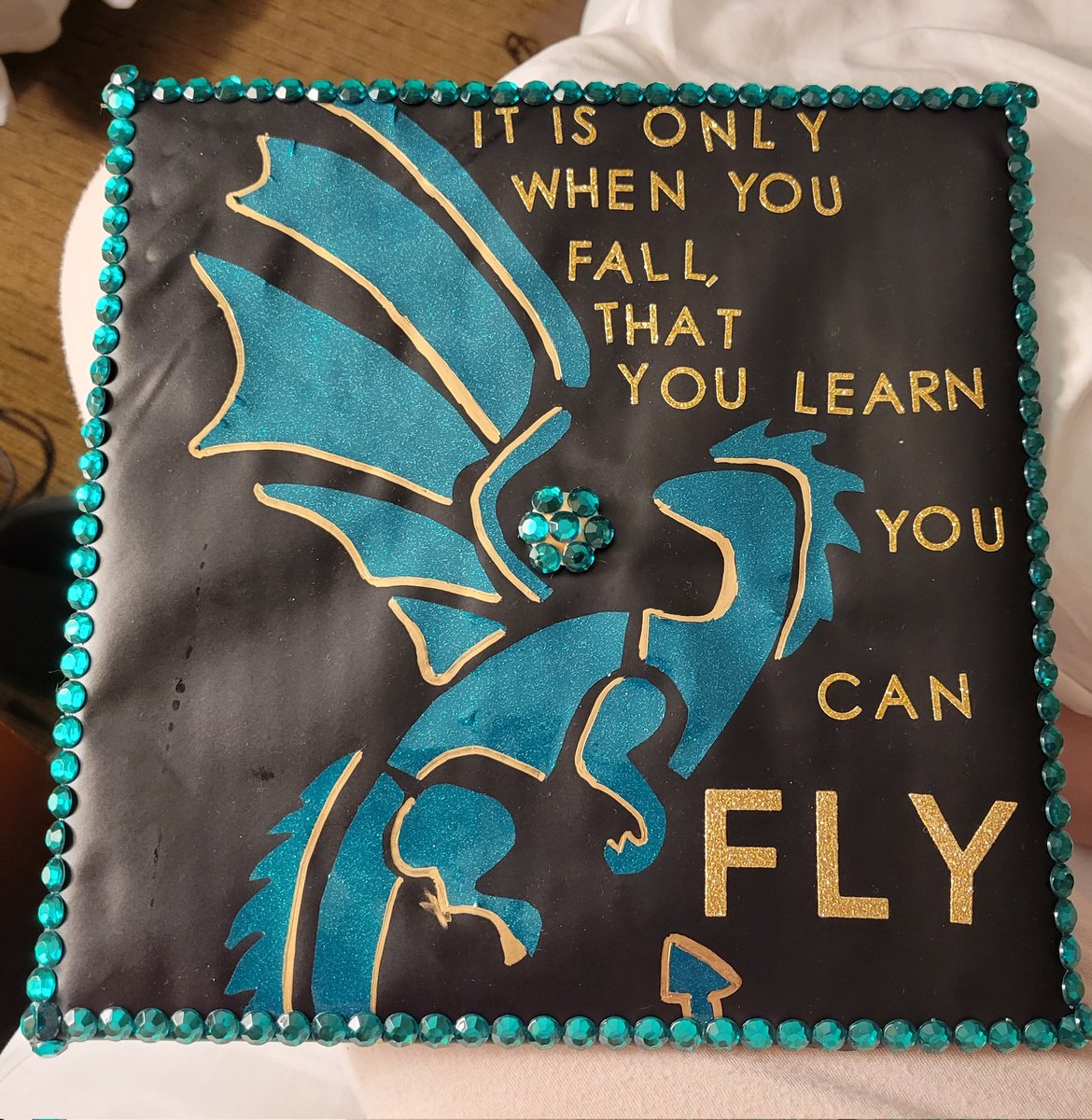 SomeCOMMkid's tweet image. Almost done! Trying to figure out what else I want to put on my cap haha, any suggestions anyone?? #graduationcap #dragonage