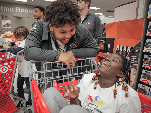 SCcooperatives's tweet photo. A few days before they’ll face off in the Touchstone Energy Cooperatives Bowl (@NorthSouthFB), future gridiron foes teamed up to help some deserving kids in Horry County. https://t.co/pRM3VaNZg1