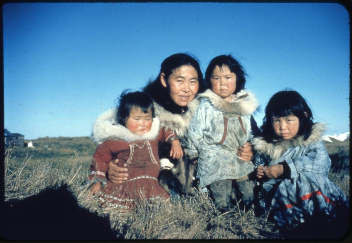 ANC_Historian's tweet photo. 1950s mother and children pose for a photograph in Newtok. Via Anchorage Museum. #alaskahistory #newtok https://t.co/qIIXaiBnxj
