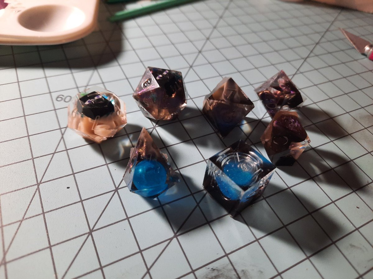 Deadderson's tweet photo. New dice! Minecraft themed (enderman) and an attempt at liquid core. @WMadien @smartcookie727 @OdmWrites #dnd5e #handmadedice #ttrpg https://t.co/EM35FHSxvB