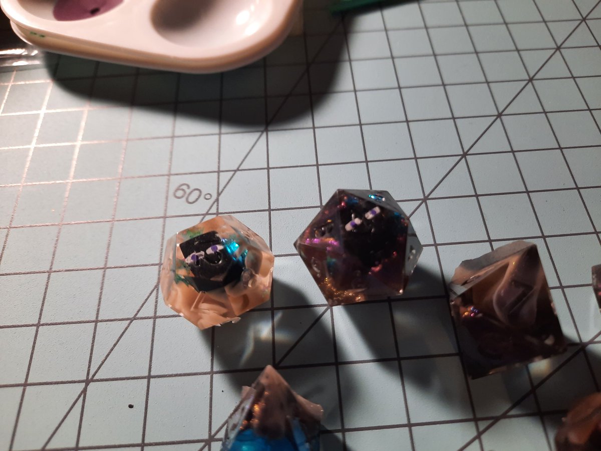 Deadderson's tweet photo. New dice! Minecraft themed (enderman) and an attempt at liquid core. @WMadien @smartcookie727 @OdmWrites #dnd5e #handmadedice #ttrpg https://t.co/EM35FHSxvB