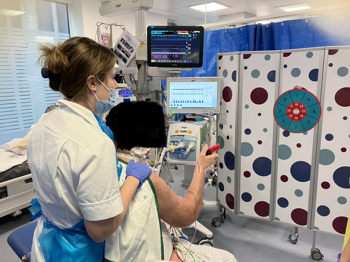 Activity based rehab in ICU delivered by OTs. Patient focused rehab at its best. Working on static sitting balance while in competition mode 🎯 #UHBWteamICU @CriticalCareOT @uhbwNHS #icurehab @uweotsociety