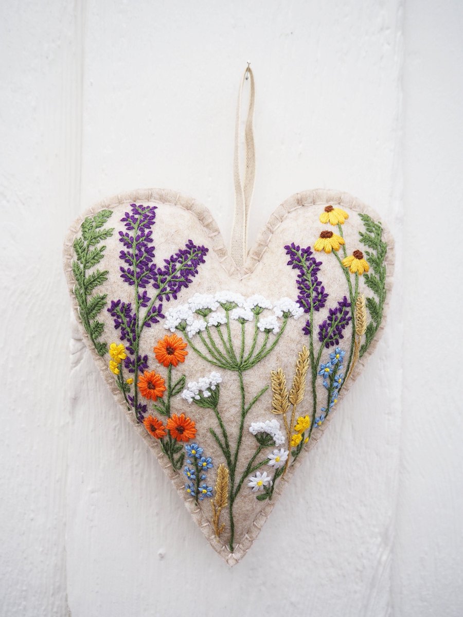Really love this, from the Etsy shop HannahBurburyDesigns. etsy.me/3uziiwM #etsy #handembroiderykit #wildflowerdesign #embroiderypattern #diyembroiderykit #hangingheart #florenceheart #flowerheart #kitsandhowto #beginnerembroidery
