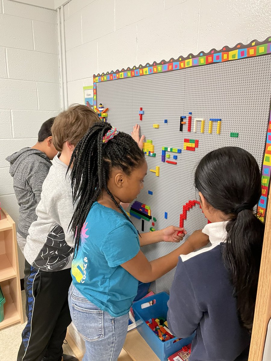 Having fun with the LEGO wall at the Learning Commons. TGIF!