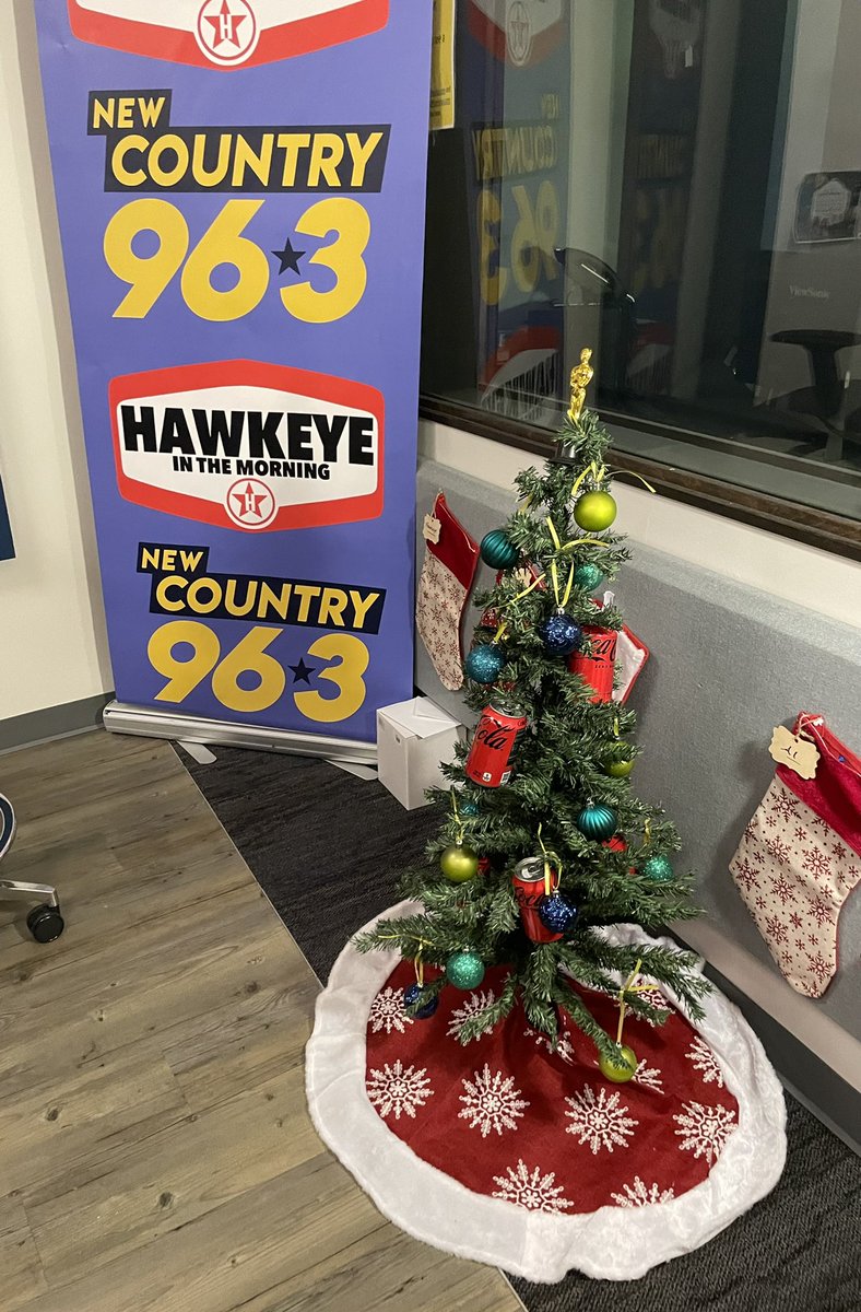 TomGRadio's tweet photo. NOW it’s Christmas! The tree is up and decorated in our studio. Can you guess who’s responsible for the Coke Zero ornaments? 😂 https://t.co/pavvFbOQsj