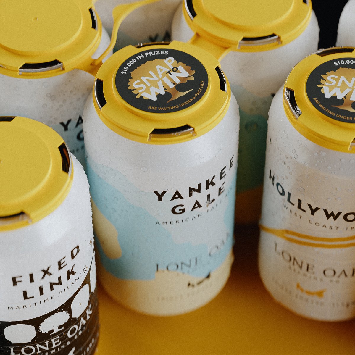 Pick up a <a href="/loneoakbrew/">Lone Oak Brewing Co</a> 6-pack for your chance to win! 👀

Check under the yellow snap-top for a prize sticker, you could win from over $10,000 worth of prizes, such as: 

📺 65” Smart TV
🧢 Lone Oak Merch
💵 Gift Cards

liquorpei.com/lone-oak-snap-… #PEI
