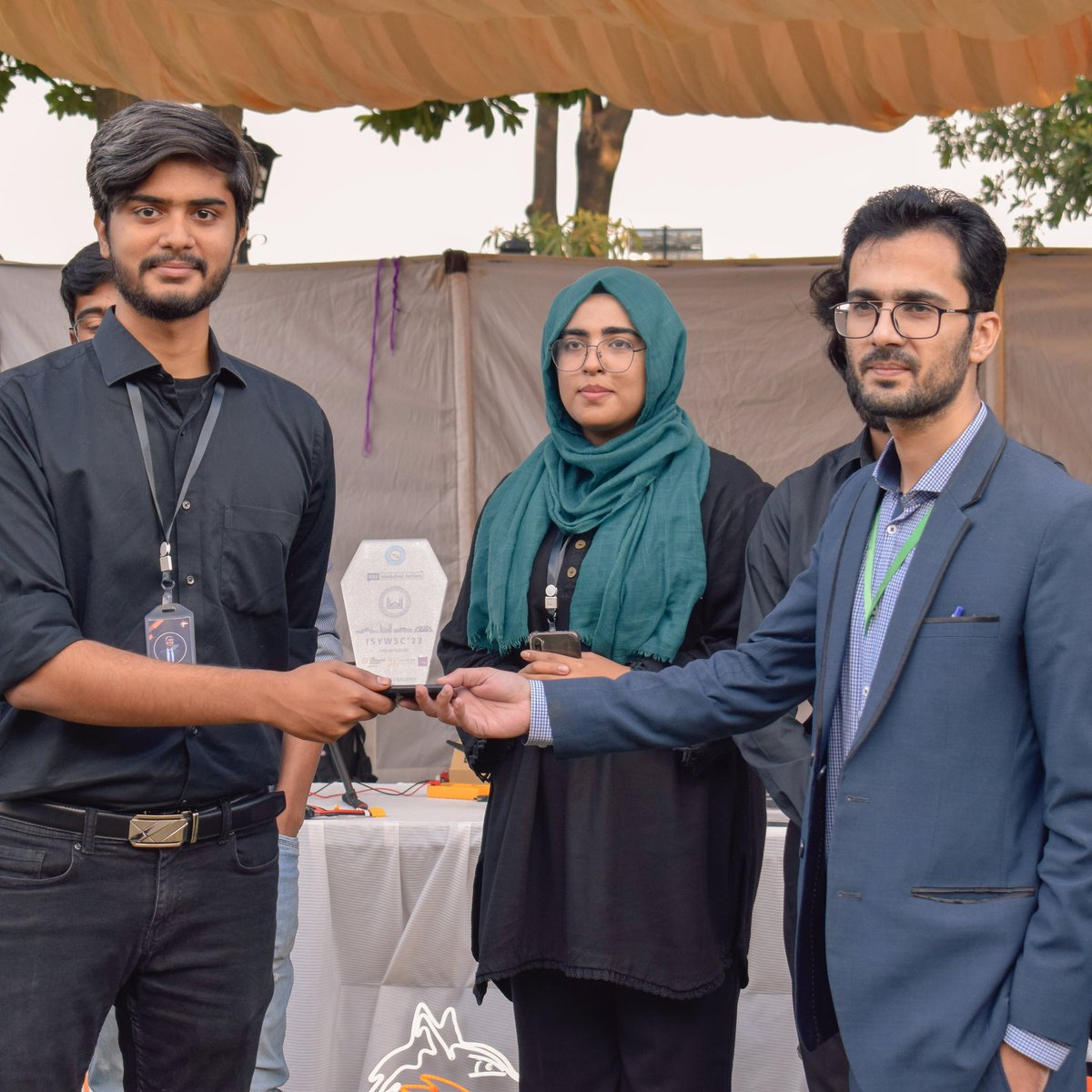 TeamFoxtrot2's tweet photo. Team Foxtrot was invited by Fast University to their recent Techno-social event “ISYWSC’22” hosted by IEEE Islamabad Section Students. We are honoured to accept the Award of Excellence presented after the display of our talent at the event and our previous achievements. https://t.co/wtwC36uWCh