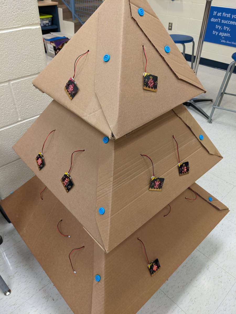 MrRuggero's tweet image. The first day of coding microbits on our cardboard tree was a hit with students. Can&apos;t wait to see what decorations they code next week! #CSEdWeek2022