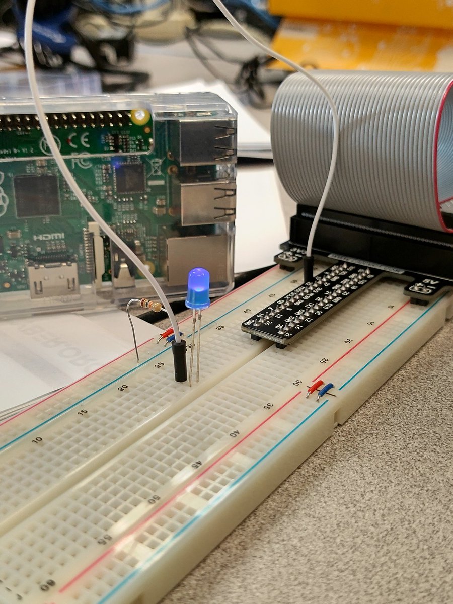 knwilson's tweet image. Using the breadboard with electronics and Raspberry Pi! Students got the lights to blink. #vted #rvtc2 #HourOfCode #CSEdWeek #raspberrypi