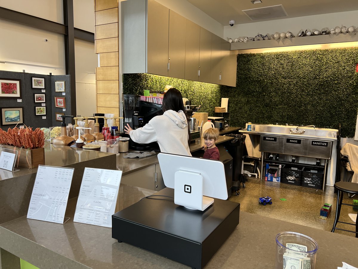 RichlandWA's tweet photo. Richland Library's Coffee Space Reopens! 
Come say hello to Laurie, owner of Kozy Kup 2, or one of her friendly staff located in the lobby of the library. If you are lucky, you may even meet the other "K" in the family, Kayden! Hours are 9am-4pm Mon - Sat. https://t.co/pfaAm9v9MC https://t.co/uIIQyKV8tr