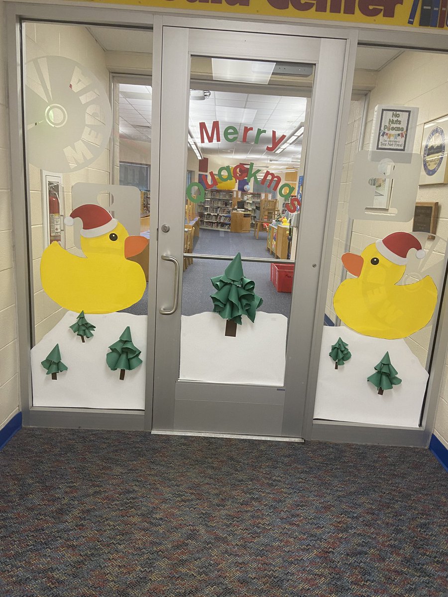 Decorating Elda’s Media Center for the holidays! Merry Quackmas!