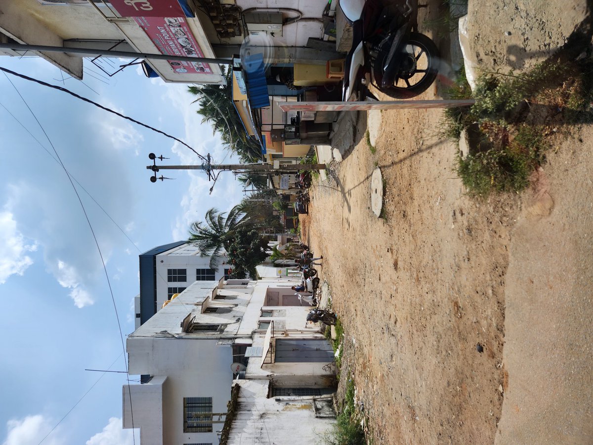 pessimisticpupp's tweet photo. Respected sirs, 
Kindly build a road here . It's lane that branches from Kudlu road to school and industries. It's difficult to use this "road" as you can see there's no road #bangaluru #noroad #struggling https://t.co/NATqR8yQL5