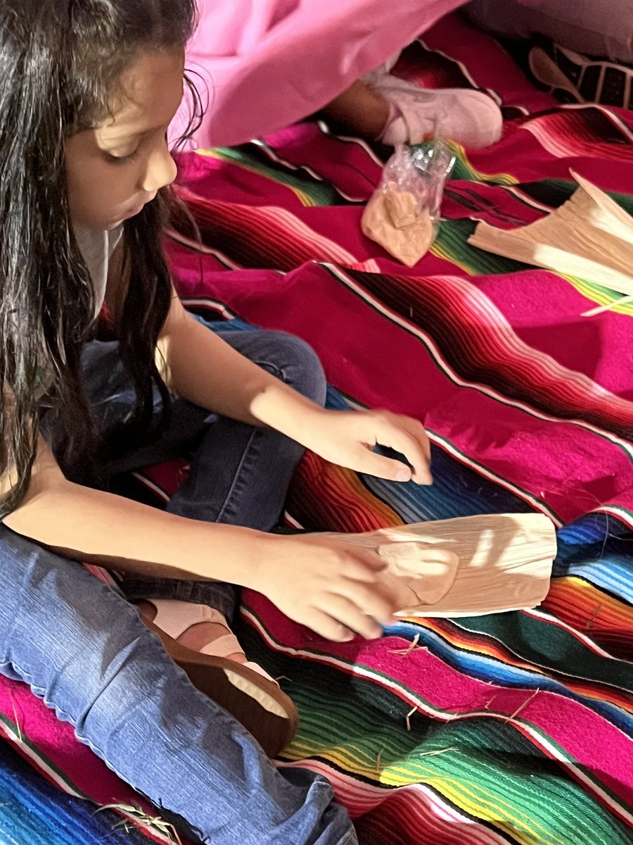 Sharon_2113's tweet photo. We enjoyed watching children practice their tamale making skills with masa as they listened to “Abuela” read, May Your Life Be Deliciosa by Michael Genhart. #Biliteracy #LFCISD #hawkpride 💙🤍 https://t.co/DvjicYSWWp