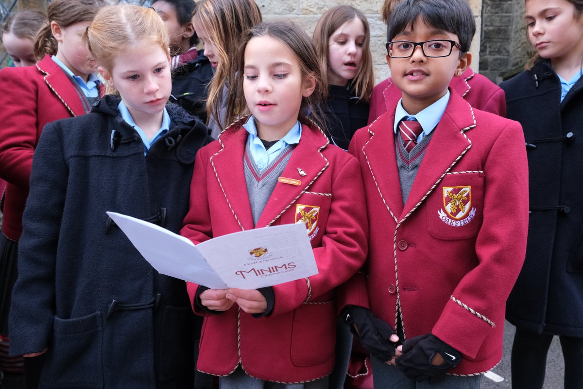 OakfieldPrep's tweet photo. The cold can't stop our festive Oakfield warmth shining through! Our Minims bringing Christmas cheer to Herne Hill School earlier this week performing Christmas classics and original Oakfield compositions ❄️🎵

#hernehill #OakfieldPrep #Minims #Singing #Christmas #Year4 #Year5 https://t.co/U6cz4ZcZJ4