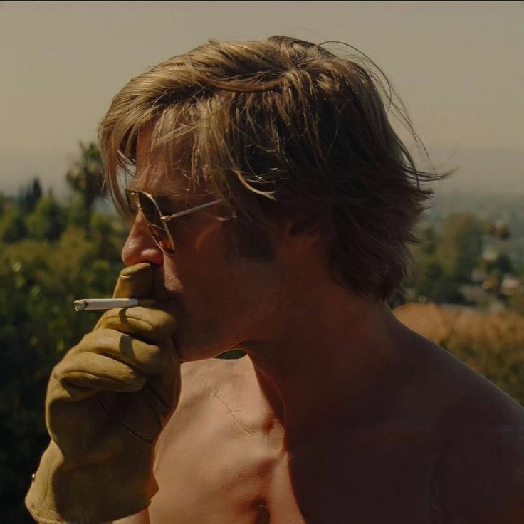 once upon a time in hollywood cigarette Brad Pitt as Cliff Booth in Once Upon a Time in Hollywood (2019)