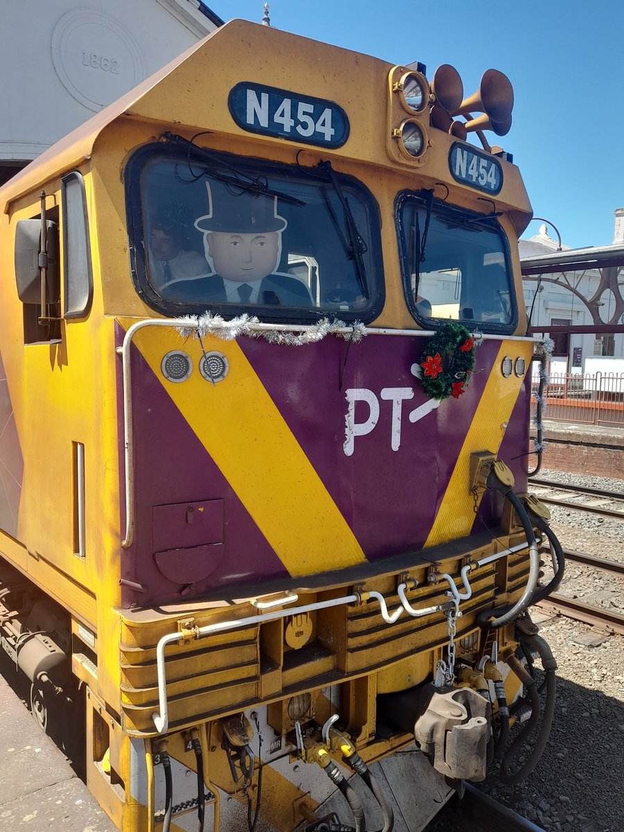 The erstwhile Sir Topham Hatt, otherwise known as the "Fat Controller" made a visit to Australia today, and in particular, Ballarat. Here he is with a diesel of the railway he was looking to buy...