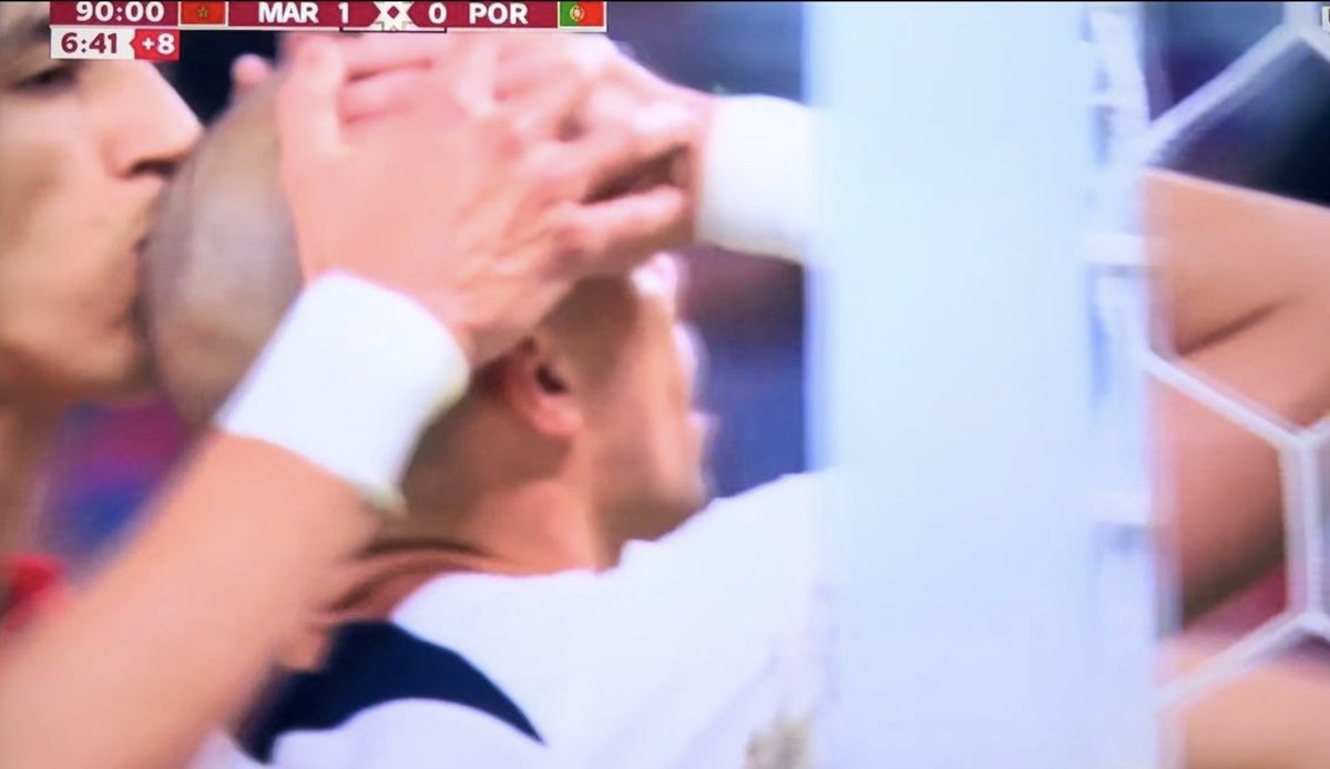 danpack6's tweet photo. @FIFAWorldCup Pepe misses a huge chance in the 97th minute, the player from Morocco gives him a kiss on the head 😭😭😭😭😭😭😭😭😭 https://t.co/rYgjsPvm1X