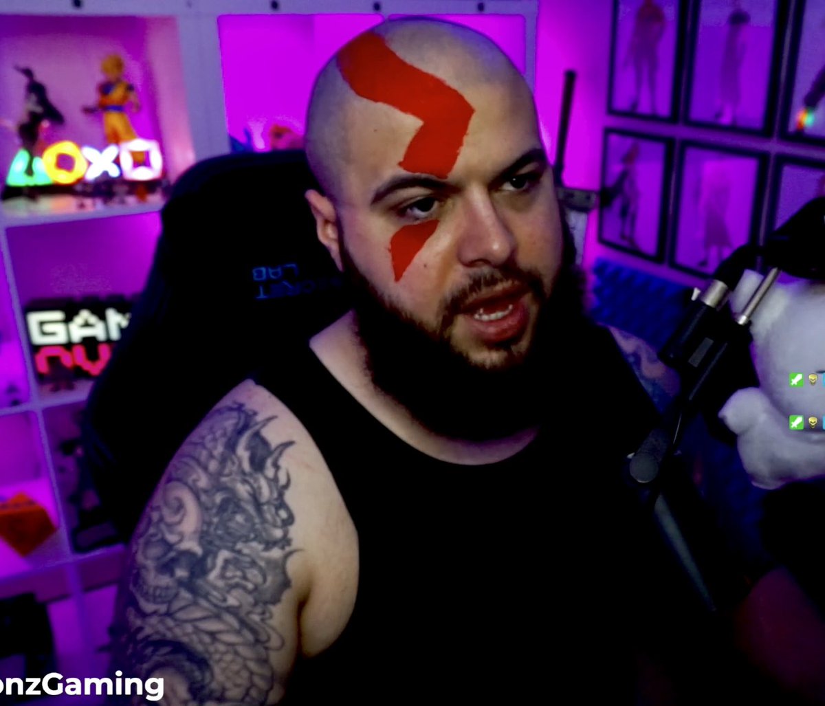 LegionzGaming's tweet photo. I can’t believe I forgot to take pictures for Kratos Cosplay 🤦🏽‍♂️ but here’s some pics from strimm of my Kratos Cosplay. 

What do you guys think?! I shaved my head for this bruh. https://t.co/TbiLSGf0f8