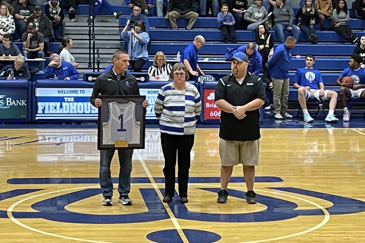 Mason County principal Seth Faulkner presented the Sapp family a Royals jersey in memory of Tony “Sumo” Sapp. Sapp was a staple in the Region for his book and record keeping. 

Tony passed away this fall and is missed by all. 

Photo credit: Daniel Scilley.