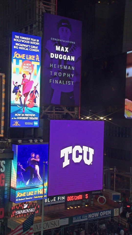 TCU's tweet photo. Times Square with a splash of purple😈🟣 #TCUxNYC #TCU https://t.co/9F9xdGaAvS