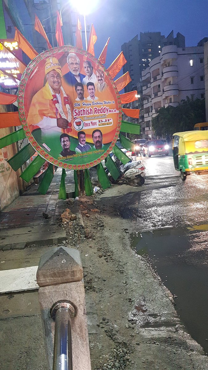 NickHill_Joeshi's tweet photo. How is this safe or sensible (or even required)? PVC pipes protruding onto the road, footpath blocked. Is this the #SwachhBharat we are so proud about?
@Tejasvi_Surya your face is plastered across this &amp; scores of such hoardings on 24th Main Road, JP Nagar. Do you endorse this? https://t.co/fjbHXD3vkj
