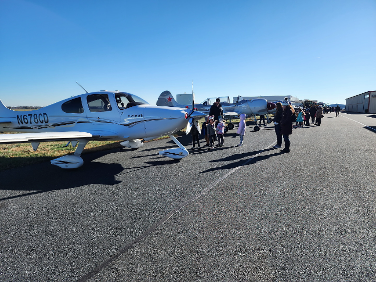 FlyILG's tweet photo. We had a wonderful time hosting the Caravel Academy Kindergarten for a visit at ILG recently!🤩 They toured the West Terminal hangars, watched some tenants fly formations, met with our friends at the Air National Guard and learned all about flying!✈️ #FlyILG #NextGenAviators https://t.co/h9OmdzOxck