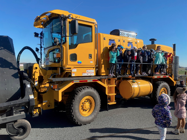 FlyILG's tweet photo. We had a wonderful time hosting the Caravel Academy Kindergarten for a visit at ILG recently!🤩 They toured the West Terminal hangars, watched some tenants fly formations, met with our friends at the Air National Guard and learned all about flying!✈️ #FlyILG #NextGenAviators https://t.co/h9OmdzOxck