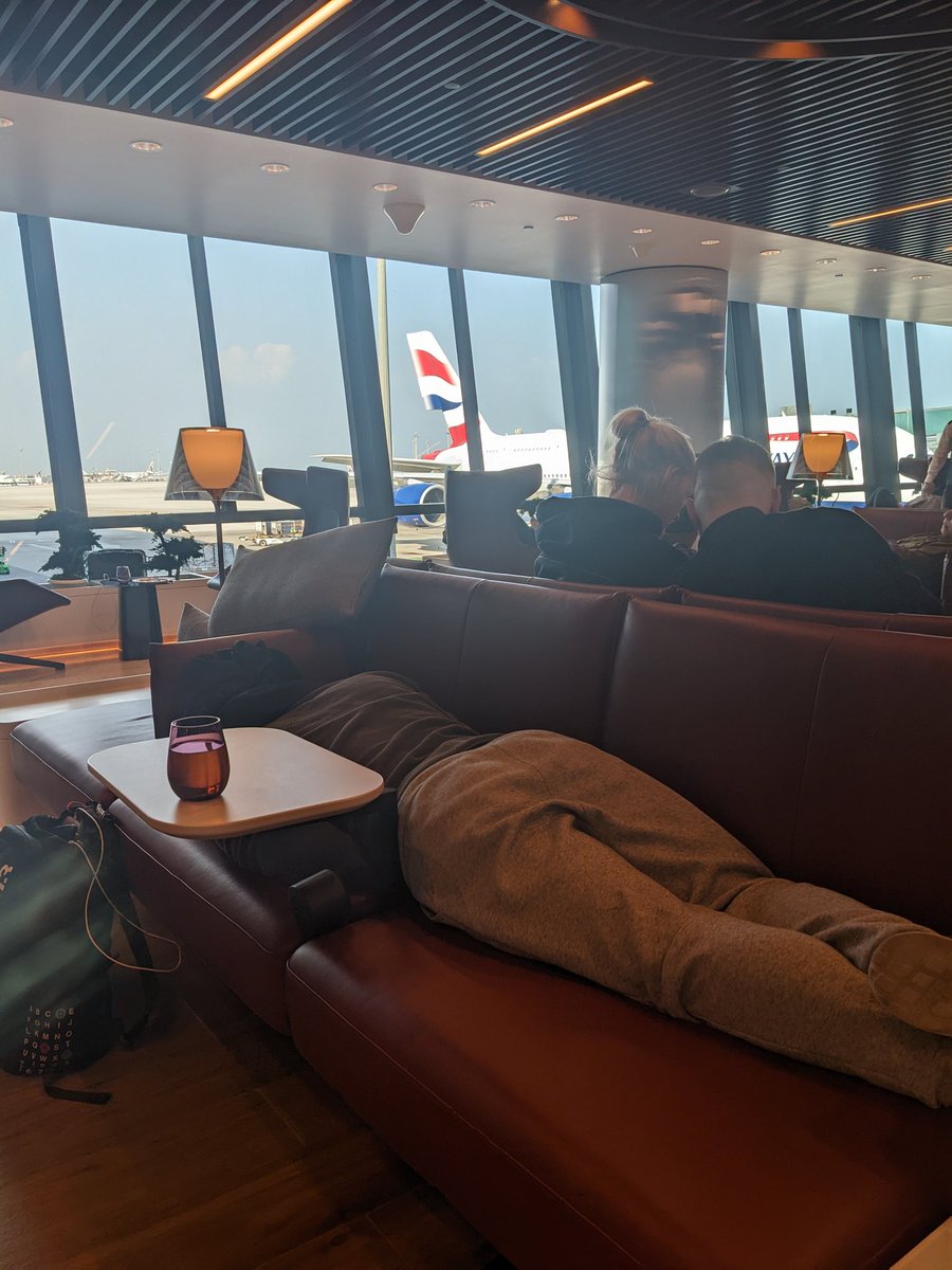 TheSLSClub's tweet photo. One of our founding club members catches a stealth nap. Hour 9 of 18 in The Silver Lounge experience.  Missed connecting flights.  No hotel and No sleeping facilities in lounge - staff wake you up. Why?
Thanks @British_Airways thanks @qatarairways @qrsupport 
#CustomerService https://t.co/b6uIuFGuWj
