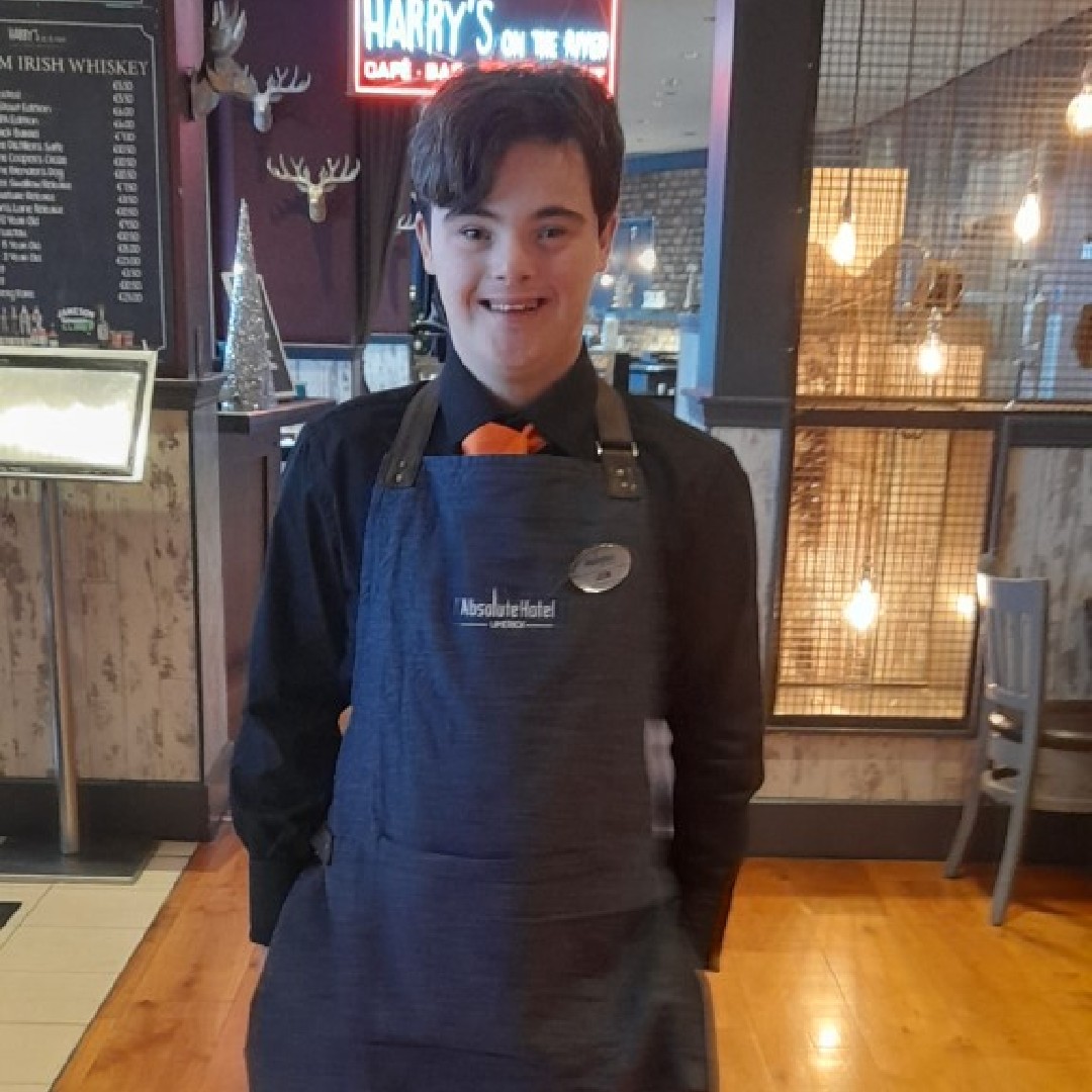 DownSyndromeIRL's tweet photo. Leon started work placement in the @AbsoluteHotelGM Limerick 👏
His role involves meeting & greeting guests, ensuring breakfast supplies are full & lots more 😊
Leon really enjoys his work placement & we wish him continued success 👏💜
#EmploymentProgramme #ShareTheJourney https://t.co/jsD0IqLESm