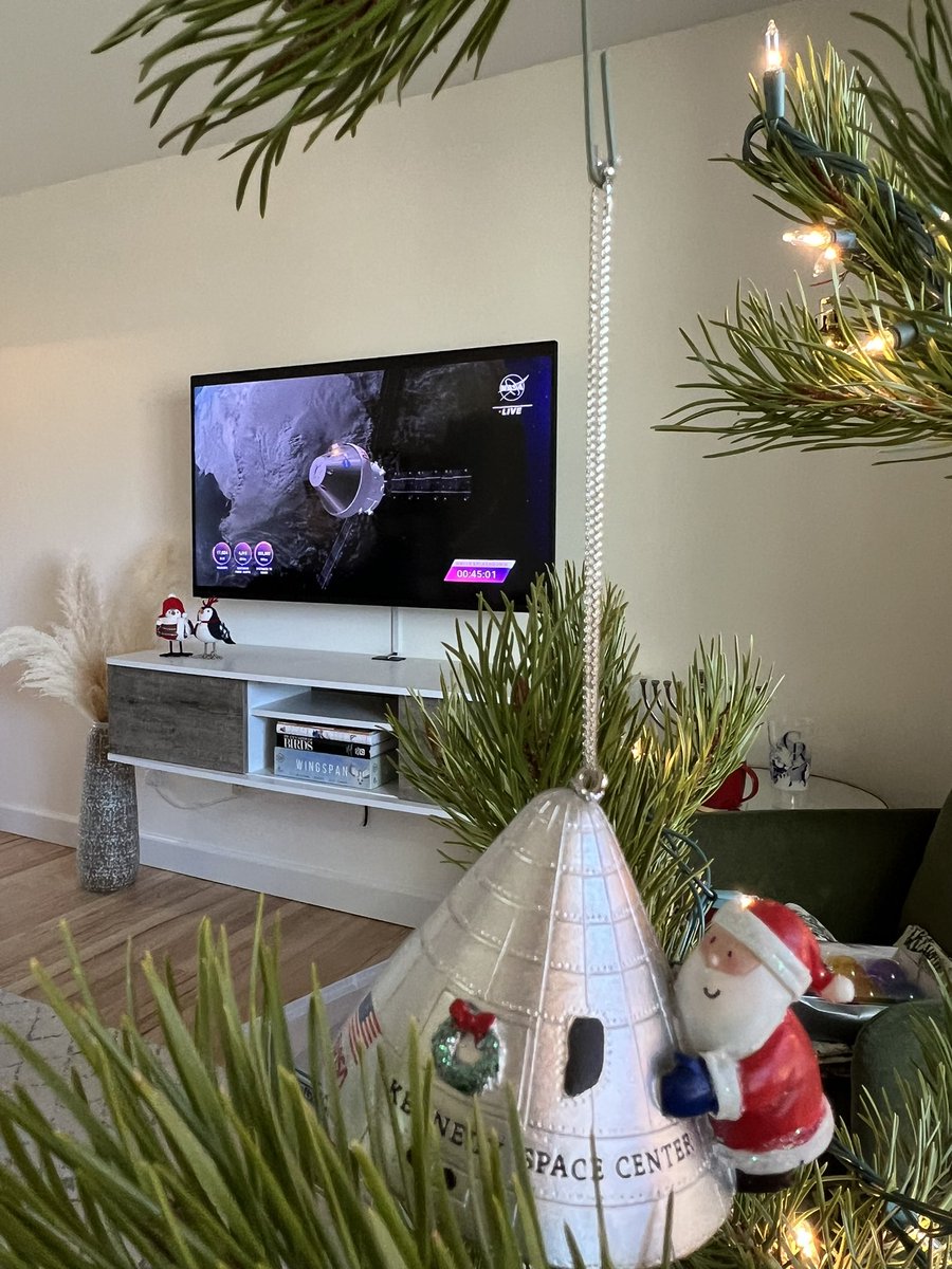 alliestarkman's tweet photo. Decorating the Christmas tree and watching NASA TV waiting for the Orion reentry! https://t.co/ZBMr2b9h1F