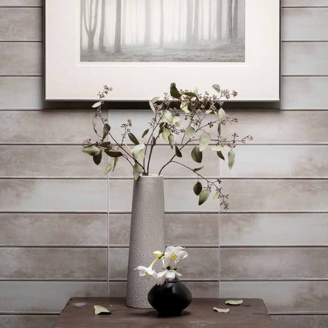 Impressions adds dimension, color, and movement to the look of concrete in a glass medium that is appropriate for both inside and outside projects. Bathrooms, kitchen backsplash, and exterior walls are all fitting for Impressions Glass Tiles.

#islandstonetile #islandstone