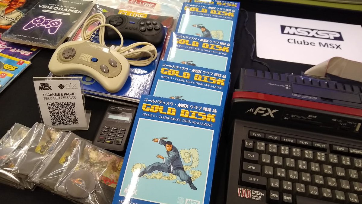 mariocavalcanti's tweet photo. Pics from Saturday. Setting the @ClubeMSX table at MSX SP 2022. FD46, Gold Disk 5 and some copies of the Clube MSX magazine. #MSX #ClubeMSX #MSXSP #MSXSP2022 https://t.co/q7hh6z5DuY