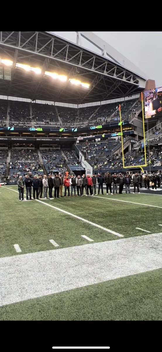 Big time honor standing on the field with some great coaches!! Great day in Seattle!!