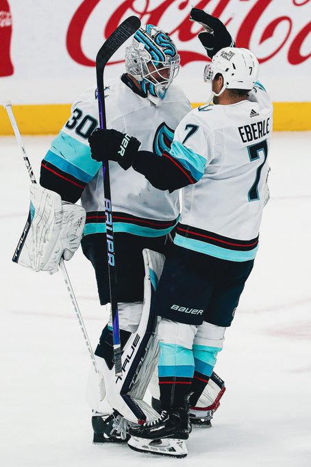 Goalie hugs featuring Ebs and Jones