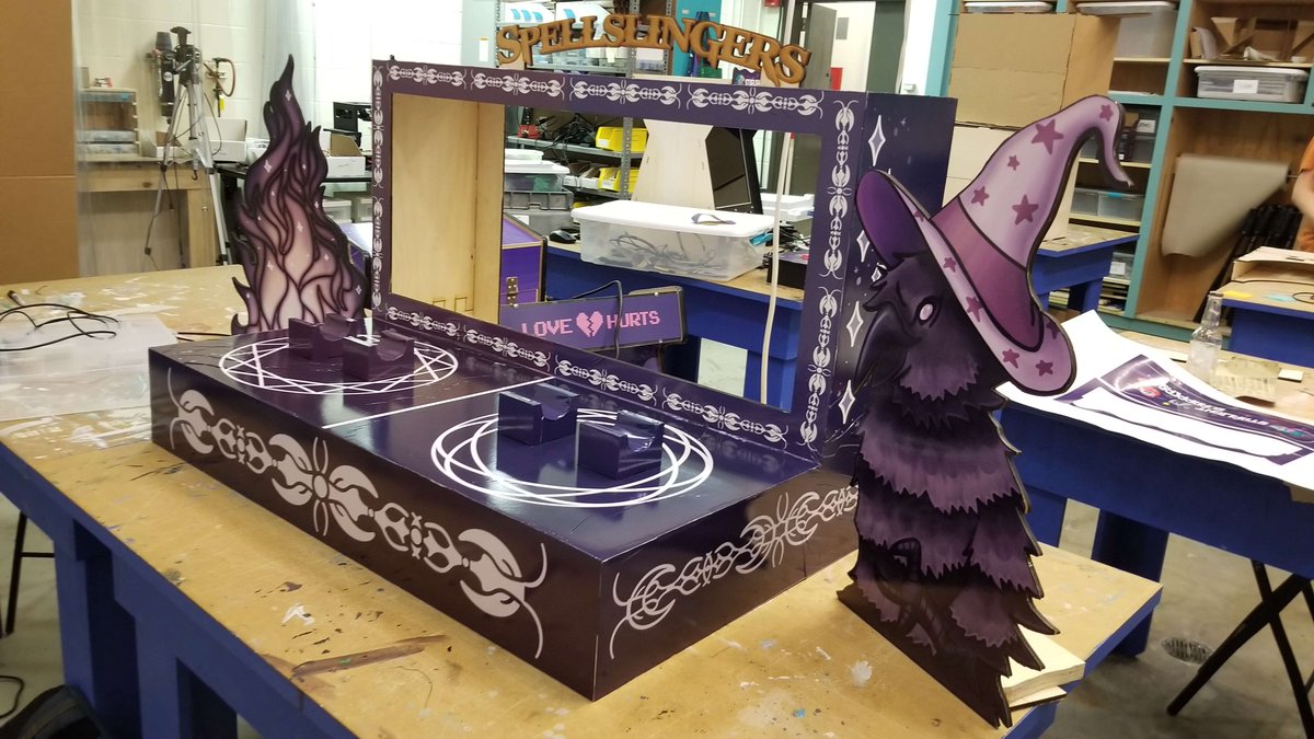 AETarcade's tweet photo. As the showcase draws near, the cabinet for Spellslingers sits ready for play with the wands all painted and waiting to cast! https://t.co/TgLacLPSiI