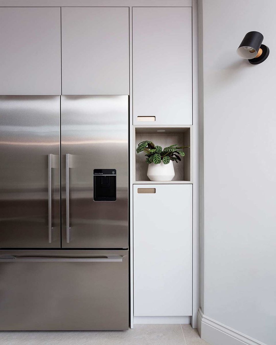 Since the kitchen is the workhorse of the home, it might be hard to even imagine having a minimalist take on one. White is an easy way to convey minimalism as it immediately feels clean and simple.