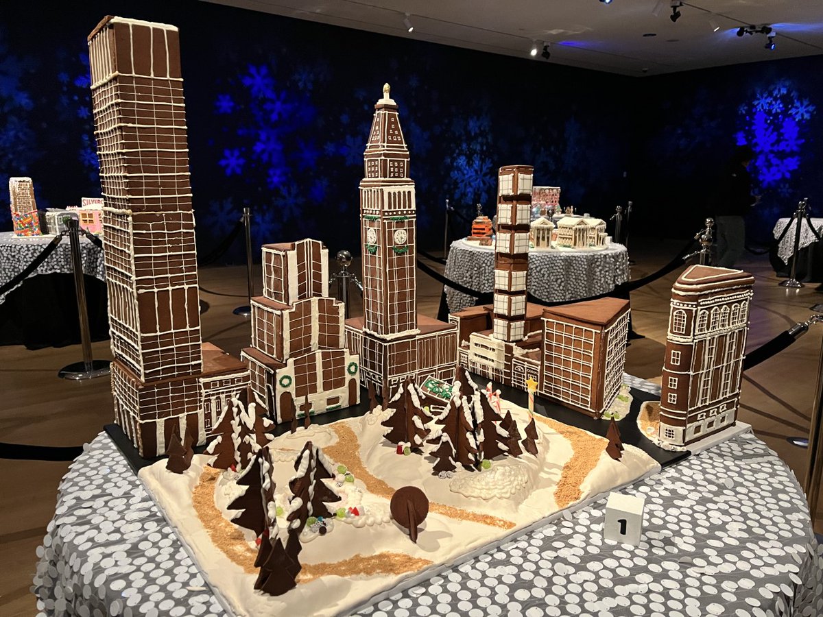 Today is #NationalGingerbreadHouseDay and we just love this gingerbread streetscape by John Kuehn featuring the landmarked Flatiron Building! You can view it and other NYC buildings recreated in gingerbread now through January 8 @mcny (also a landmark!). #NYCLandmarks